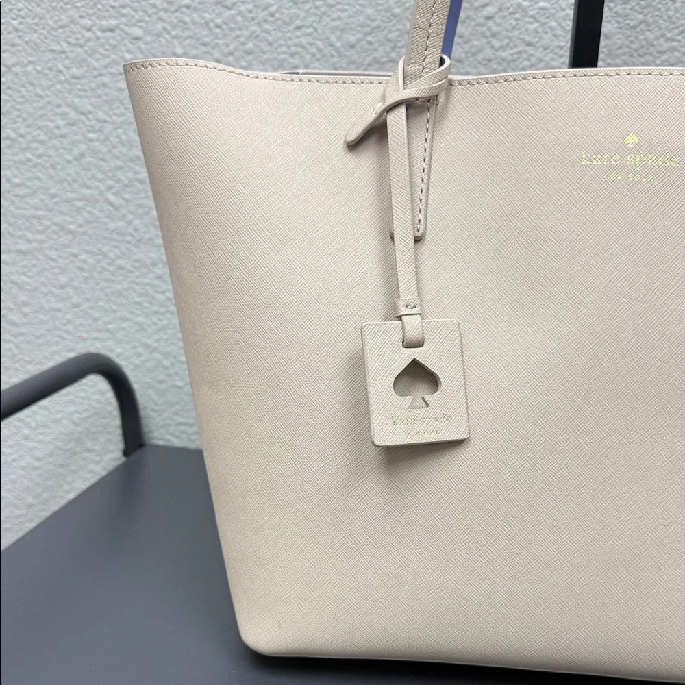 Kate Spade Beige Tote with periwinkle Interior